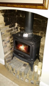 Rustic brick firebox, concrete hearth